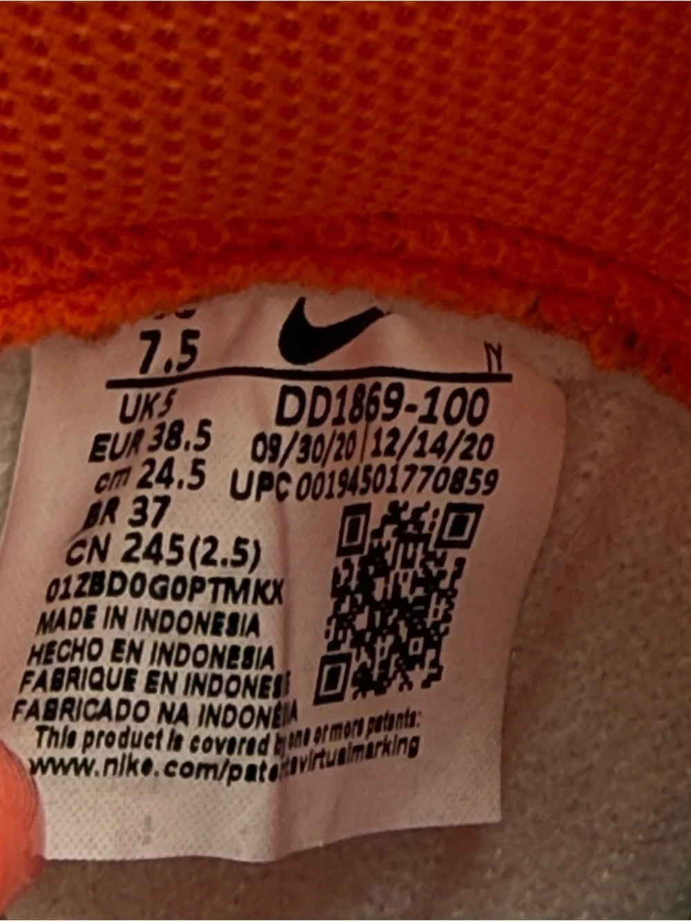 Nike High-Top Athletic Sneakers in Orange and White